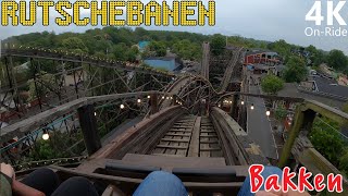 Rutschebanen  4K OnRide  Bakken  Wooden Coaster From 1932  KumbaK Trains [upl. by Nipsirc]