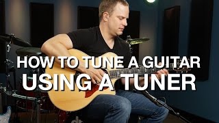 How To Tune A Guitar Using A Tuner [upl. by Gilmer]