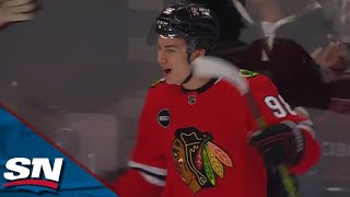 Blackhawks Connor Bedard Ignites Crowd In Home Opener With Powerplay Snipe [upl. by Pevzner]