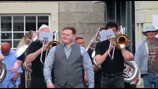 Kirkby Lonsdale Bands in competition march down street [upl. by Olatha495]