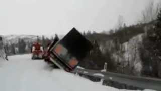 Tow Truck Crashes over Cliff in Snow Accident [upl. by Ellerrehc]