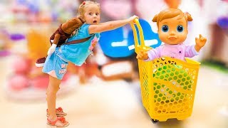 Nastya and baby doll doing shopping  song for kids Nursery Rhyme by Nastya at the candy shop [upl. by Sihonn661]