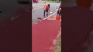 Ceramic particle bicycle lane paving process [upl. by Kreiker]