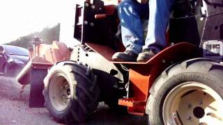 TRANCHEUSE 420SX DITCH WITCH SCIE A ROCHER [upl. by Eitsirc]