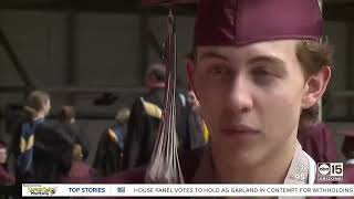 Months after losing his leg Mountain Ridge High senior walks across the stage at his graduation [upl. by Enerod]