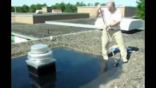 Application of Butyl Liquid Rubber over ballasted epdm roof [upl. by Anasiul]