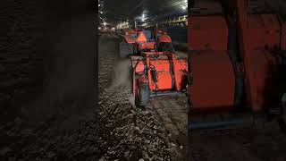 KubotaCreekview Windrowing chicken litter Kubota M6060 and Creekview windrower [upl. by Ahsyas]