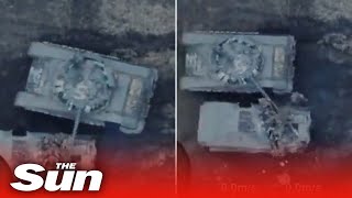 Watch as Russian tank commander takes out FIVE of his own men using turret in blundering footage [upl. by Acinnej]