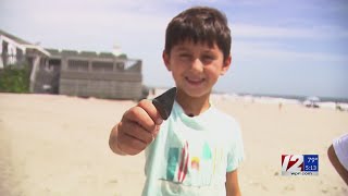 6yearold finds fossilized shark tooth at RI beach [upl. by Redman246]