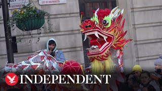 London celebrates Chinese New Year with dragons and parade [upl. by Earlie]