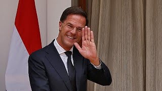 Watch Dutch PM Rutte applauded after clearing up own coffee spill [upl. by Buskus]