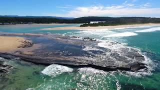 drone burrill lake nsw dolphin point entrance to main street south coast nsw [upl. by Nrev461]