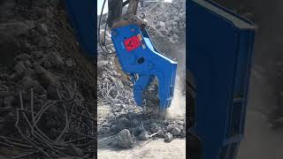 The process of cutting a concrete reinforcement column with hydraulic tongs [upl. by Intyrb]