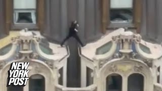 Shocking video shows man casually jumping across rooftop of NYC highrise  New York Post [upl. by Kcirrad]