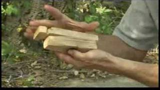 Starting a Fire With a Bow Drill Fire Starter  Making a Bow Drill Fireboard [upl. by Enelam]