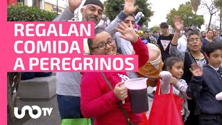 Familias se organizan para regalar comida a peregrinos que arriban a la Basílica de Guadalupe [upl. by Jenine]