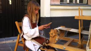 Hand weaving at Medieval fair in Ljubljana 7th June 2012 [upl. by Rani]