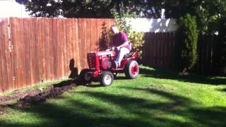 Wheel Horse plowing gardenn [upl. by Ahsilram]