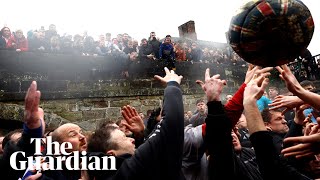 Thousands gather for annual Royal Shrovetide Football game [upl. by Ivo]