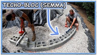 How To Build a Curved Concrete Block Retaining Wall [upl. by Aldus]