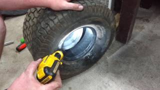 How to Install tube in lawn mower tire [upl. by Bensky]