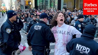 WATCH ProPalestinian Protesters Are Detained After Disrupting Macy’s Thanksgiving Day Parade [upl. by Leahcar]