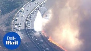 Helicopter battles new fire along Simi Valley California highway [upl. by Acenom]