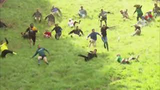 Cheese rolling race Hundreds compete in Coopers Hill event in Gloucestershire UK 1 [upl. by Aeslehc]