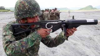 US Philippine Marines NonLethal Weaponry Taser Riot Gun Stingball Grenades [upl. by Rybma]