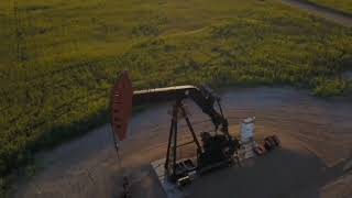 Flying over Canola and Punp Jacks in Saskatchewan [upl. by Buller]