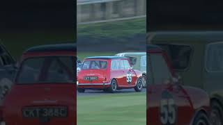 Tiny Minis gang up to overtake Jaguar GoodwoodRevival [upl. by Acisseg36]