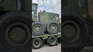 Oshkosh Mk48 Container handler carrying CAT Grader [upl. by Neirod223]