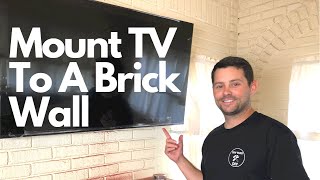 How To Mount A TV in a Brick Wall Hang a TV on Concrete [upl. by Ennayoj355]