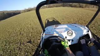 Rzr 570 top speed in a field [upl. by Yusem]