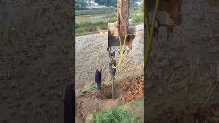 Hole drilling tool combined with excavator [upl. by Ahsaekal]