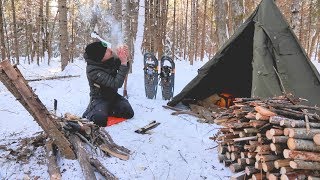 SOLO WINTER BUSHCRAFT CAMP Post Ice Storm Bowdrill Canvas Tipi Shelter [upl. by Halullat]