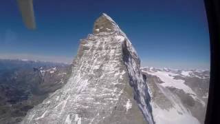 Helicopter flight over the Matterhorn Swiss Alps [upl. by Acinomahs55]