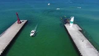 Pentwater Michigan 4K Drone DJI Phantom 4 Flying around the lake [upl. by Anerehs]