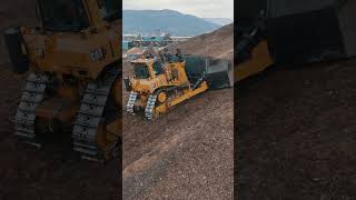 Big dozer on the stockpile D9 shoving up a blade full of hog fuel tree bark and other tree bits [upl. by Airaet5]