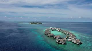 Raffles Maldives Meradhoo Resort  overwater villas enclave  brilliant drop flight aerial views [upl. by Tisha845]