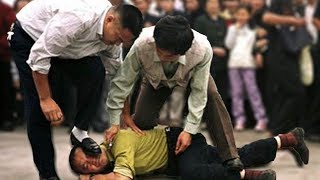 Targeting Xinjiang “Terrorists” Is Not New Remember Falun Gong  China Uncensored [upl. by Nnazus]