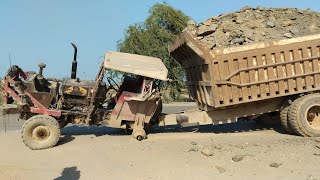 Lifting up heavy accident tractor trolley with caterpillar wheel loader [upl. by Divaj]