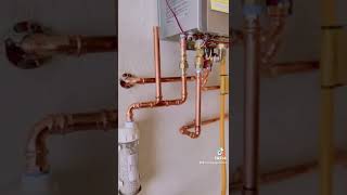 Installing a new tankless water heater Rinnai [upl. by Sinnal]