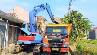 Mini Excavator Digging Loading Dirt Into Dump Truck Komatsu PC75UU [upl. by Kelbee444]