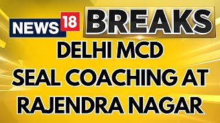 Delhi Coaching Flood  MCD Officials at Delhis Rajendra Nagar Seals Several Coaching Institutions [upl. by Kellina641]