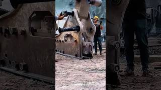 Repairman dismantles large bucket of excavator with iron rod [upl. by Solberg]