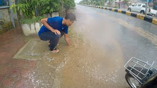 Unclogging Culvert Drain Rain Water On Street Road [upl. by Yaya51]