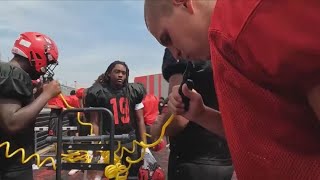 High school football players battling through the heat during fall camp [upl. by Ahseyn]