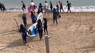 Barceloneta beachChildren enjoying paddle board riding [upl. by Jamesy]