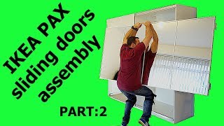 IKEA PAX WARDROBE Sliding doors assembly Part 2 [upl. by Ecreip]